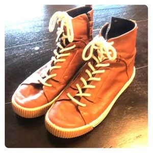 Leather high tops with a zipper on the side